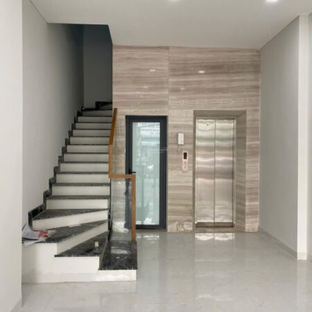 Bán nhà MT đường Tân Mỹ, Tân Phú, thiết kế đẹp 6 tầng, thang máy, đối diện cổng chợ Tân Mỹ, 26 tỷ