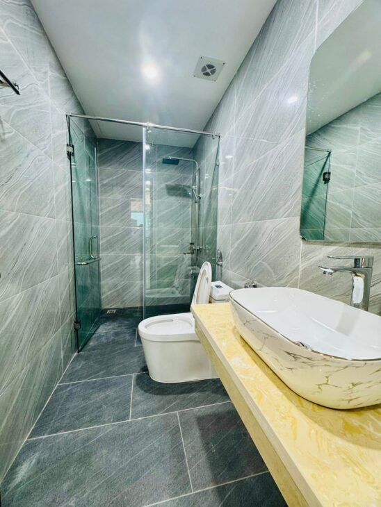 BÁN NHÀ LÔ GÓC NAM DƯ – NGÕ ÔTÔ TRÁNH, VÀO NHÀ – 6 TẦNG THANG MÁY – GIÁ 7 TỶ