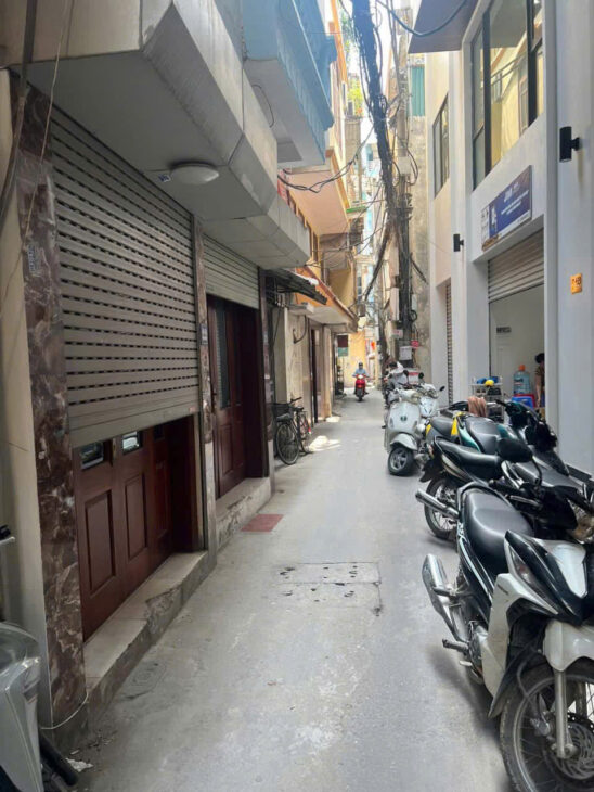 BÁN NHÀ NGUYỄN KHANG – NGÕ THÔNG DT 56m2 7 tầng MT 4m Giá 15.3 tỷ