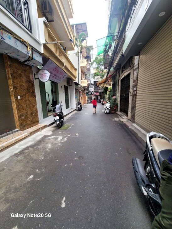 BÁN NHÀ HOÀNG QUỐC VIỆT CẦU GIẤY LÔ GÓC 3 MẶT NGÕ NGÕ Ô TÔ THÔNG KINH DOANH THANG MÁY 21 TỶ